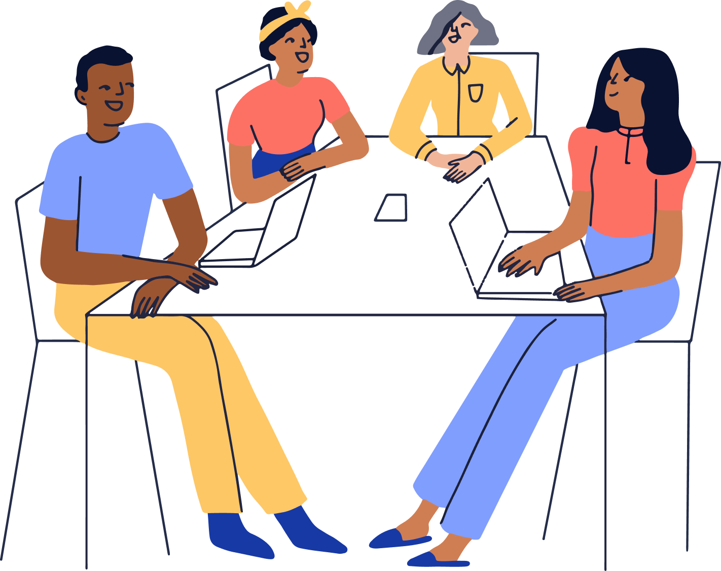 Four people sitting at a table collaborating